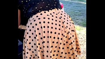 Outdoor Temptress Bares Her Bra And Deep Cleavage For All To See