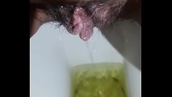 Desi Babe Unleashing Her Golden Stream